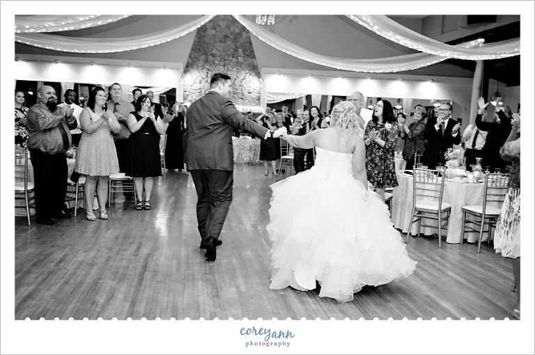 bride and groom entering wedding reception at springvale ballroom