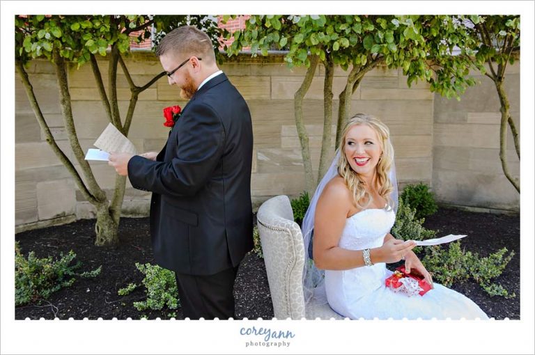Bride and Groom reading letters they wrote