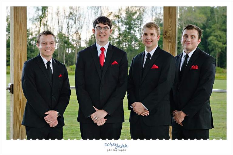Groom and Groomsman in Black and Red