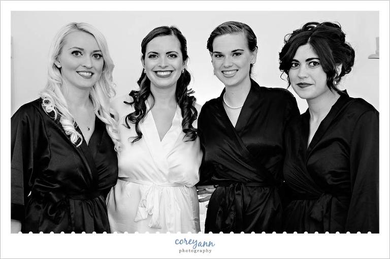 Bride and her Bridesmaids in robes before wedding