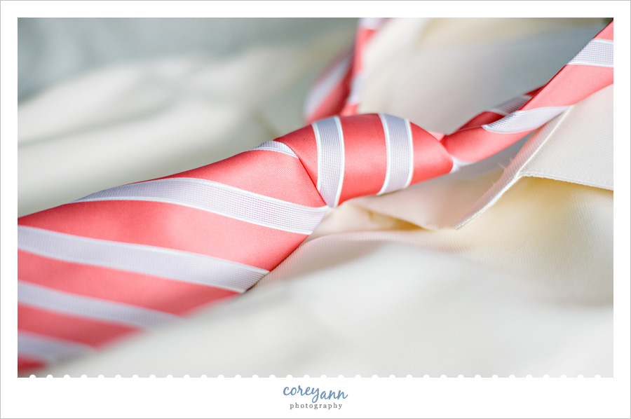 pink and silver tie for groom outfit on wedding day