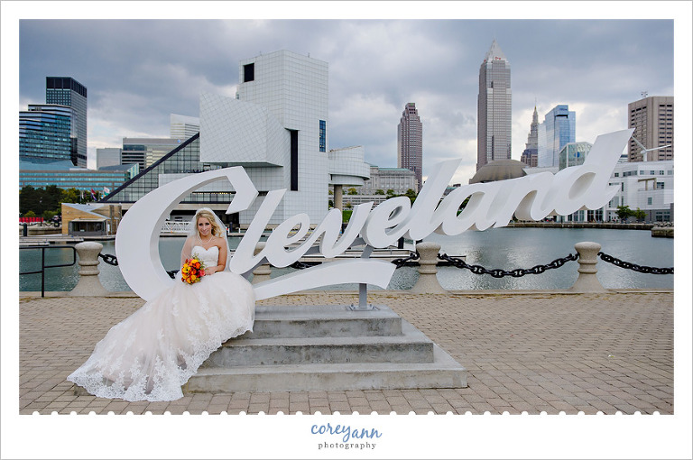 bride on cleveland script sign at e 9th street pier