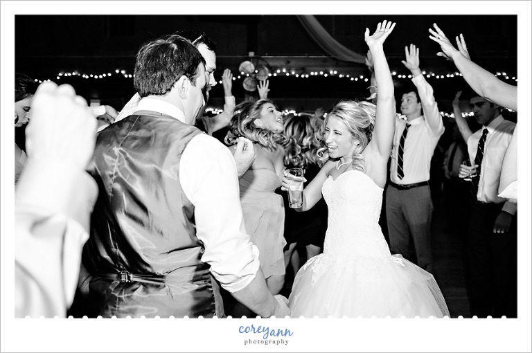 bride and groom dancing at wedding reception 