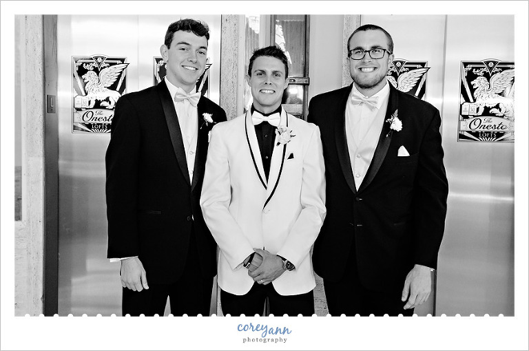 Groom and groomsman at the Onesto Lofts in Canton Ohio