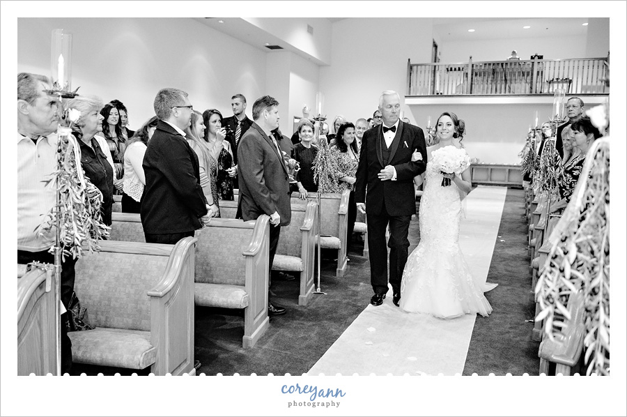 Bride walking down aisle at Louisville Church of Christ