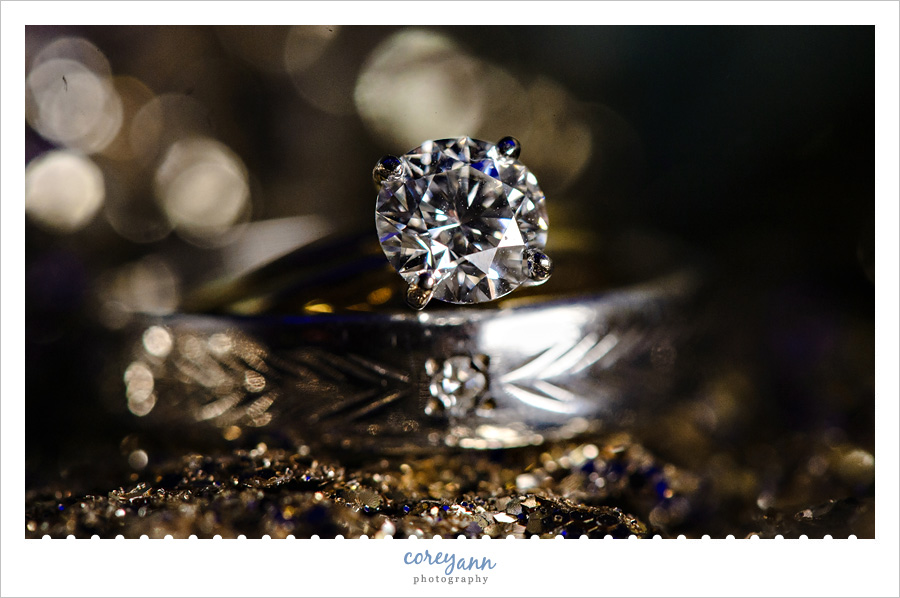 Gold glitter background with wedding rings