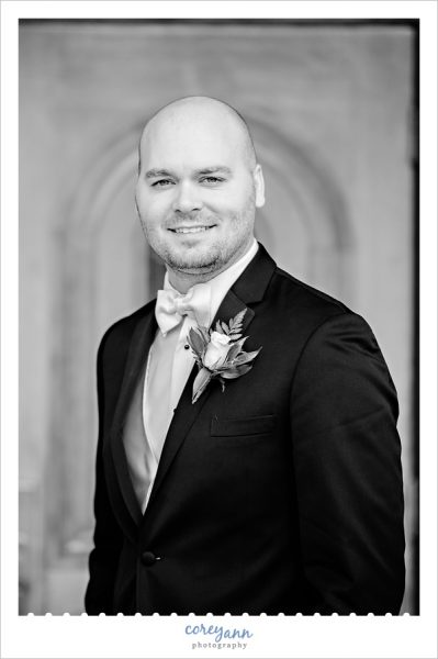 Groom portrait in black and white before wedding ceremony