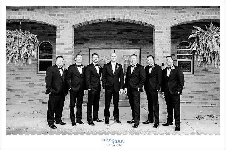 Groom and Groomsman outside of St Michael Church