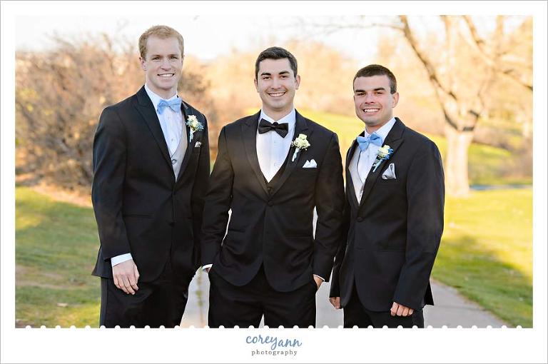 Groom and Groomsman in tuxes for November wedding