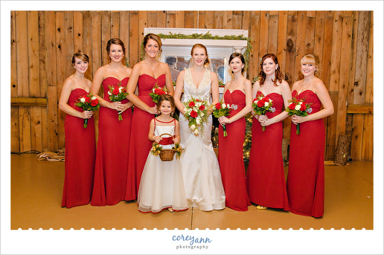 Bride and Bridesmaids in long red gowns