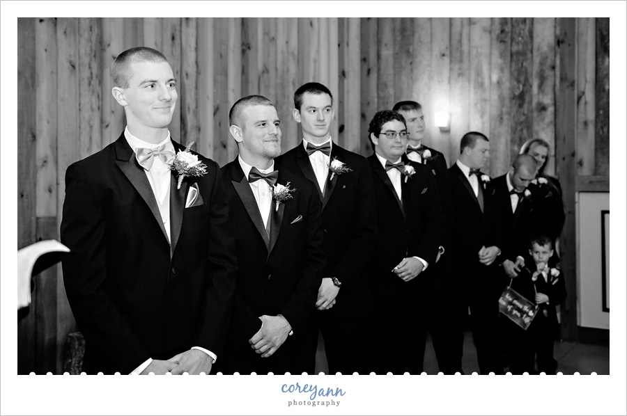 Groom seeing bride at wedding ceremony