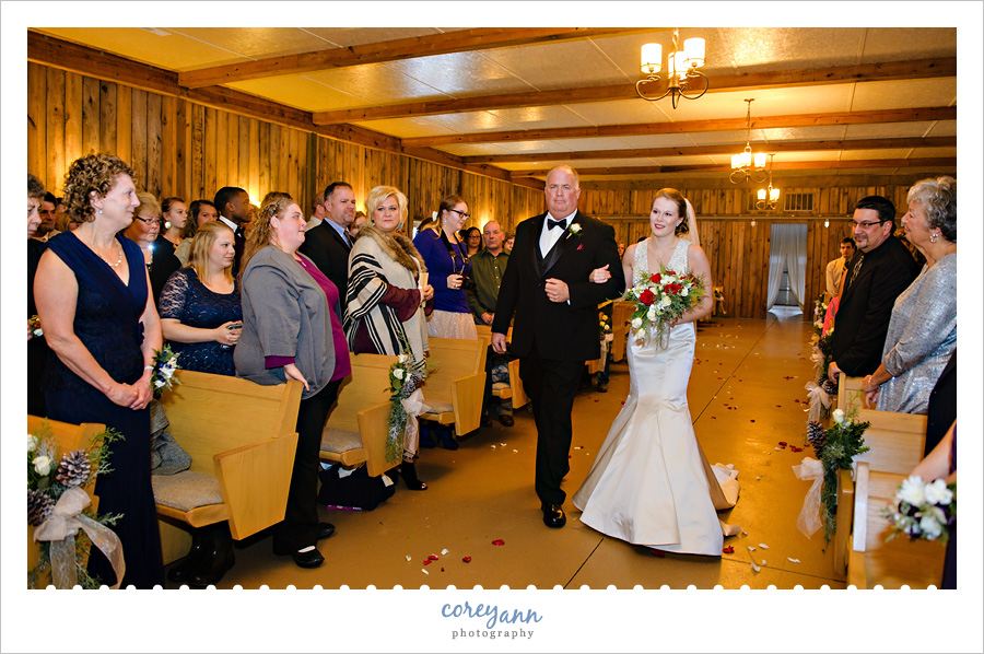 Bride and Father walking down aisle for wedding