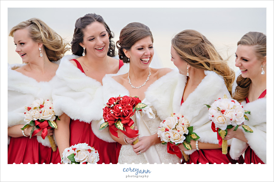 Bridesmaids in fur stoles at winter wedding
