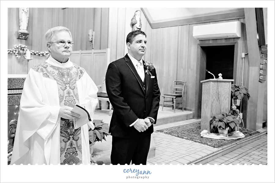 Groom waiting for Bride to walk down aisle