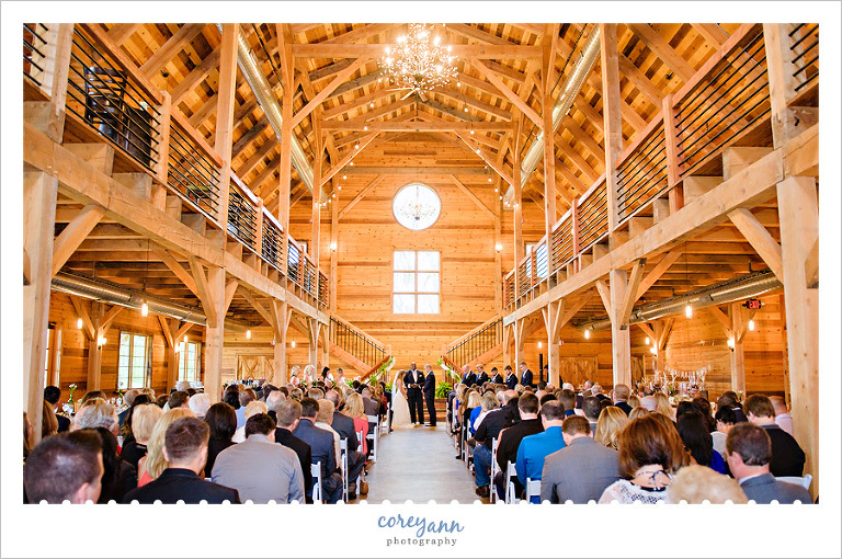 Indoor wedding ceremony at Mapleside Farms