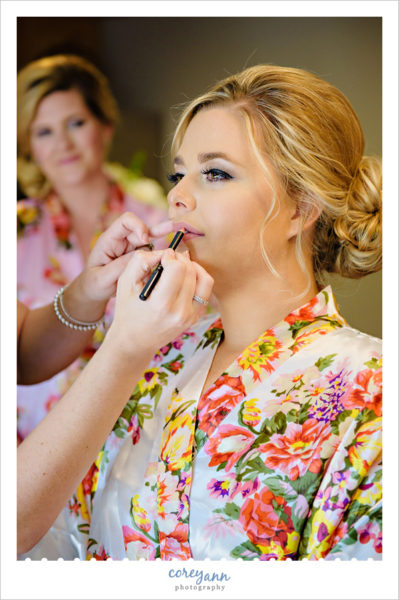 Rachel Lorraine Artistry doing bridal makeup