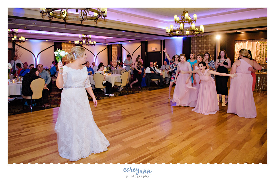 Bouquet toss at wedding reception at Tangier