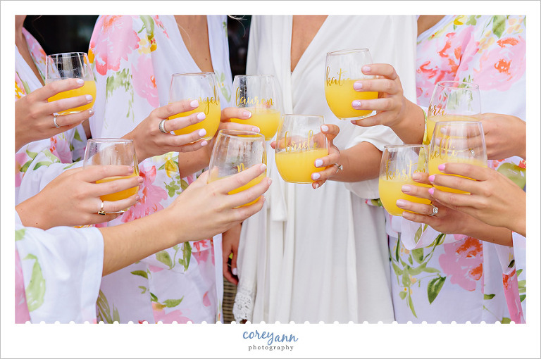 Wedding toast while getting ready with mimosas