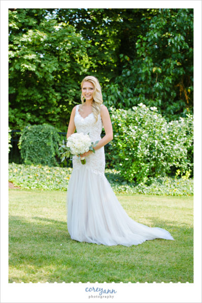 Bride with White Bouquet by Baumanns Florist 
