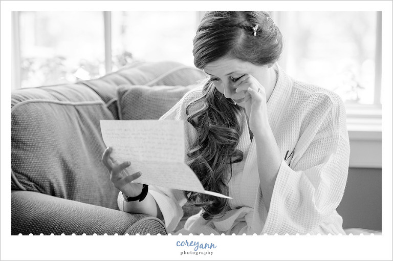 Bride Crying While Reading Letter Before Wedding
