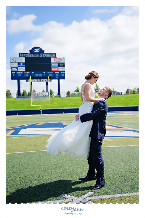 Bride and Groom Wedding Photo on Football Field