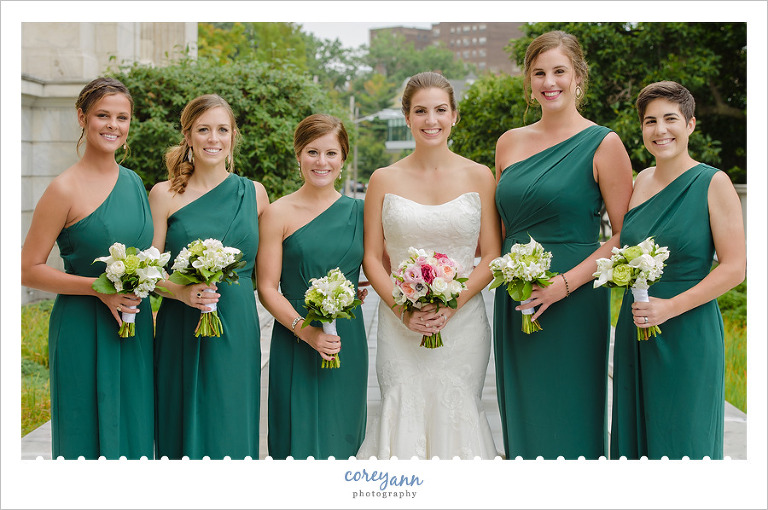 Bride and bridesmaids in green dresses