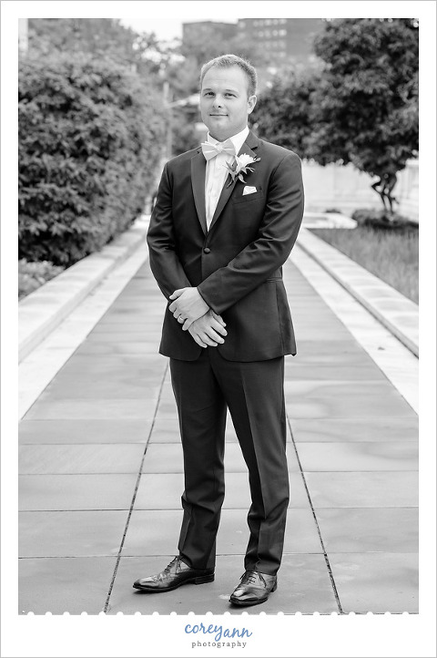 Black and white photo of the groom in Cleveland