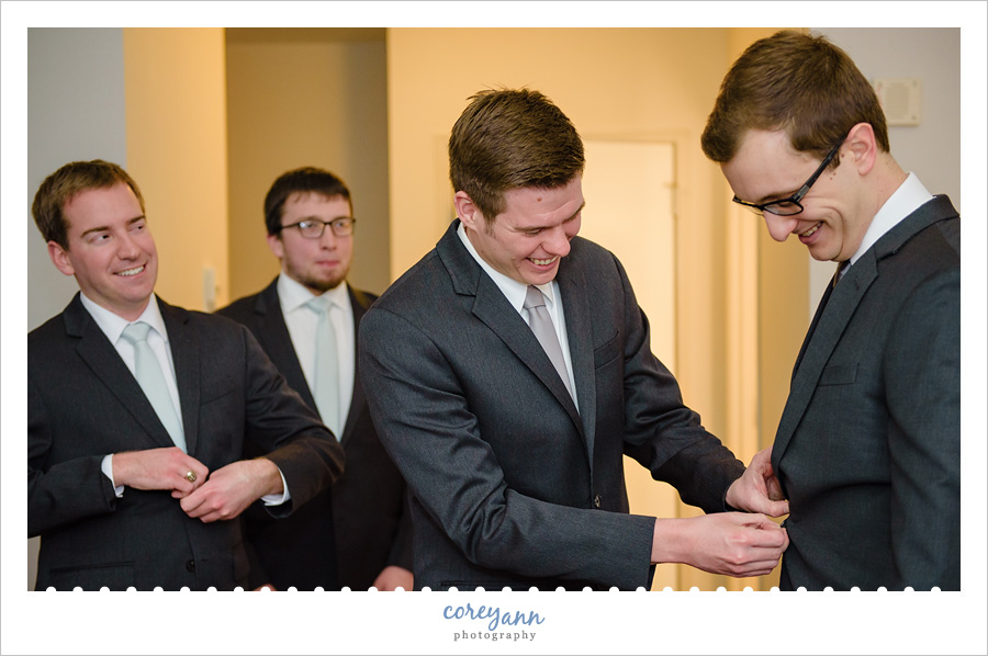 Groom getting ready for wedding at Cleveland Hyatt Arcade