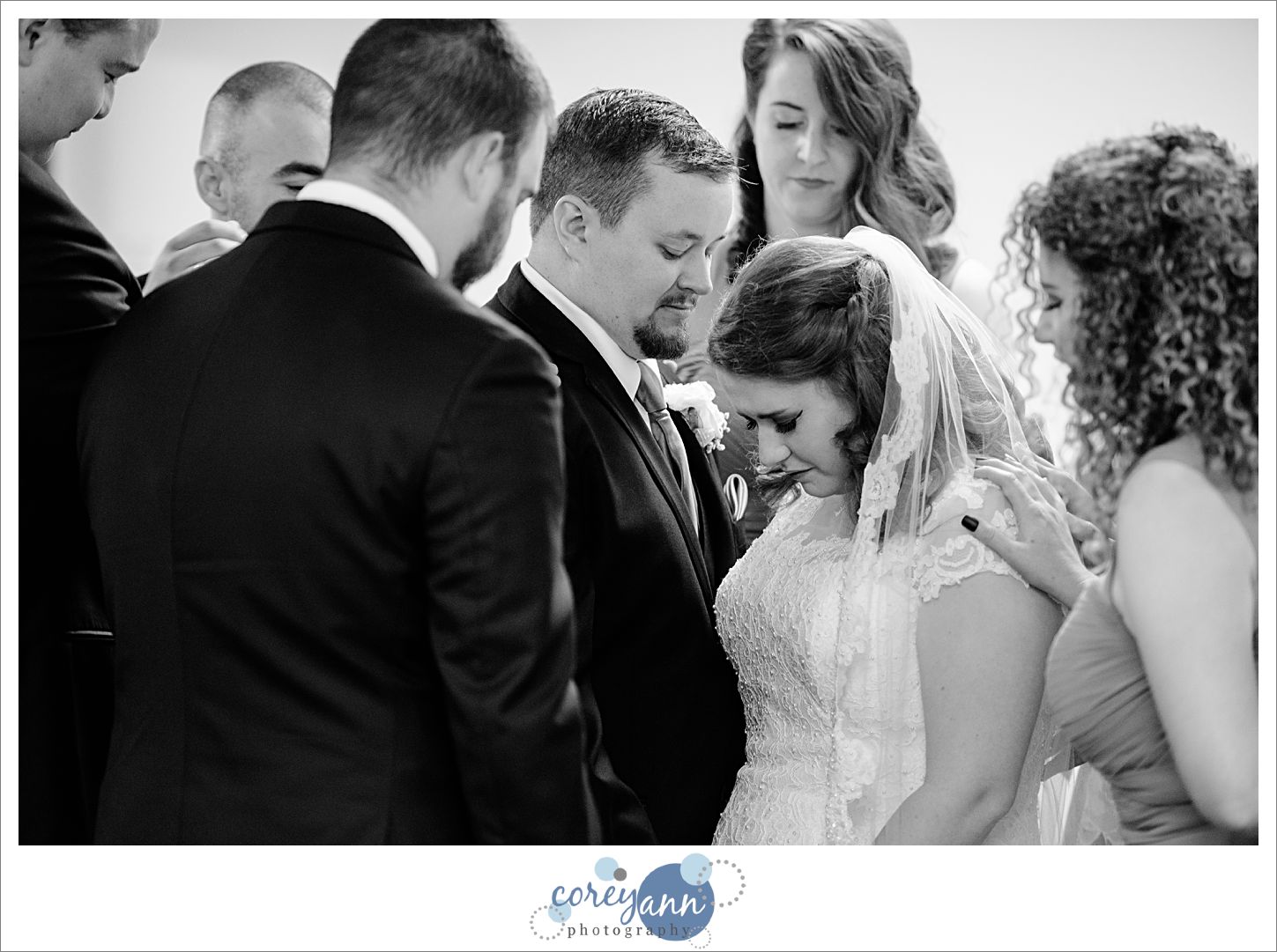 Bridal Party Praying Before Wedding