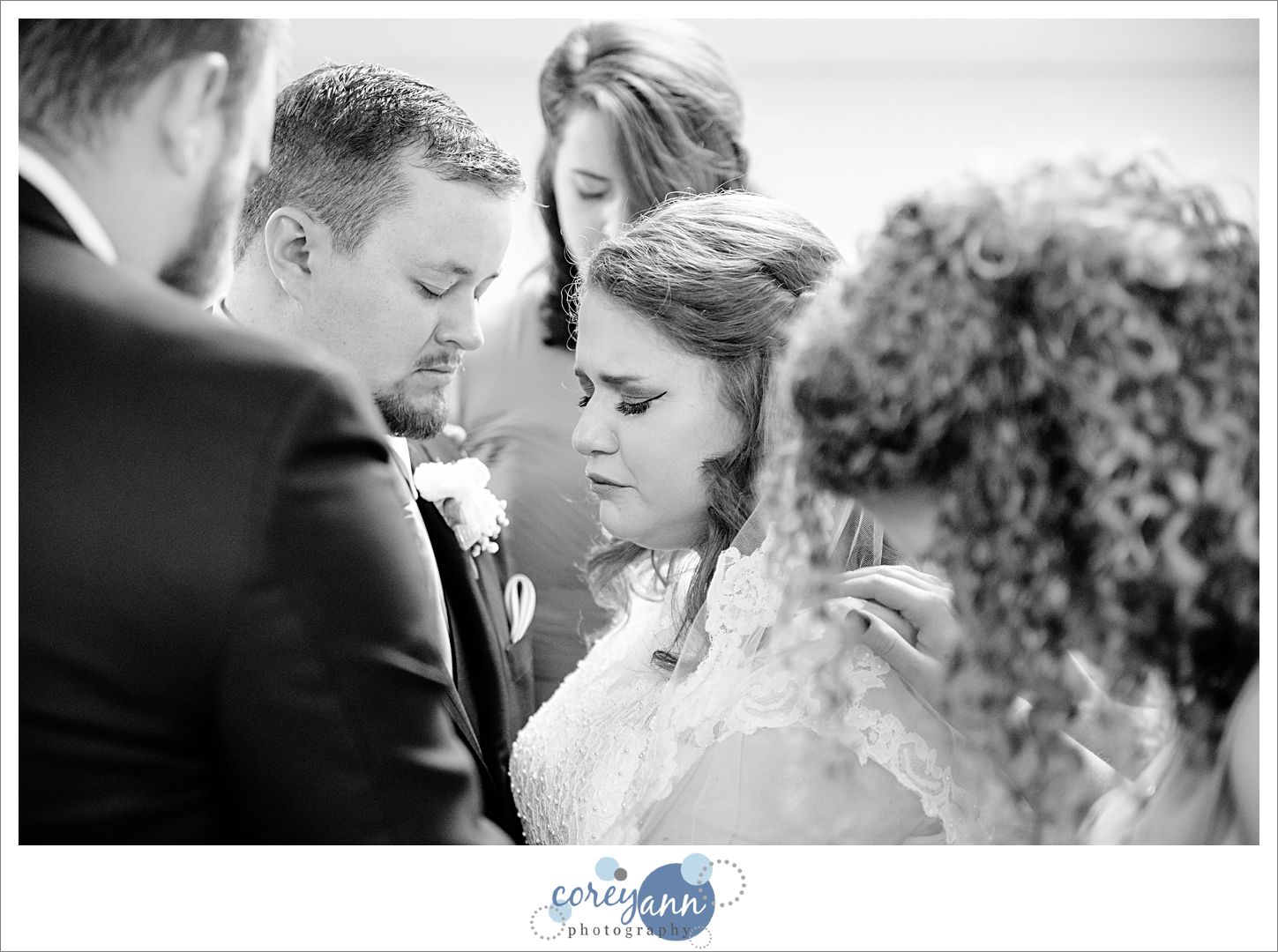 Bridal Party Praying Before Wedding