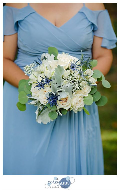 Light blue Azazie bridesmaid dress with blue bouquet
