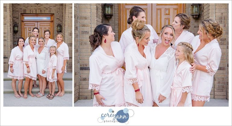 Bride and bridesmaids in robes before wedding