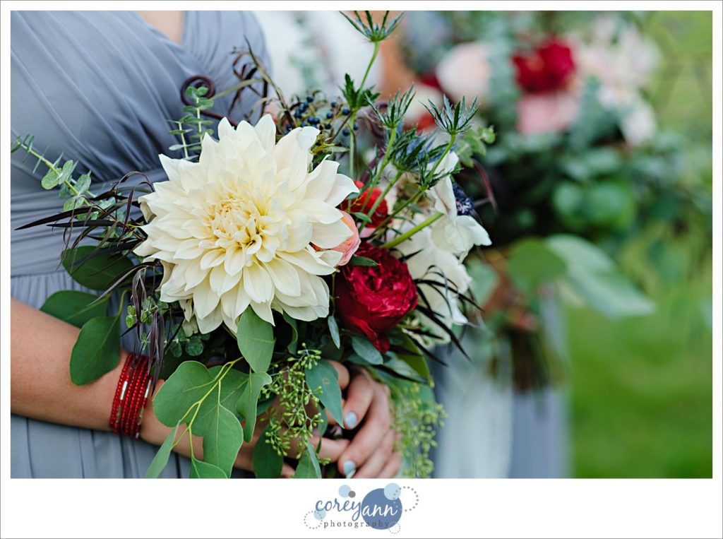 Bridesmaid wedding bouquet in red blue and white