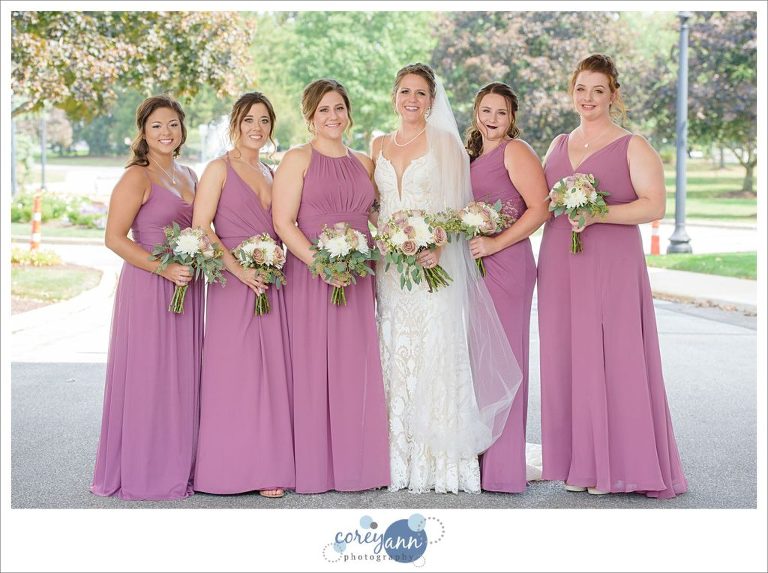 Bride and Bridesmaids in long lavender gowns