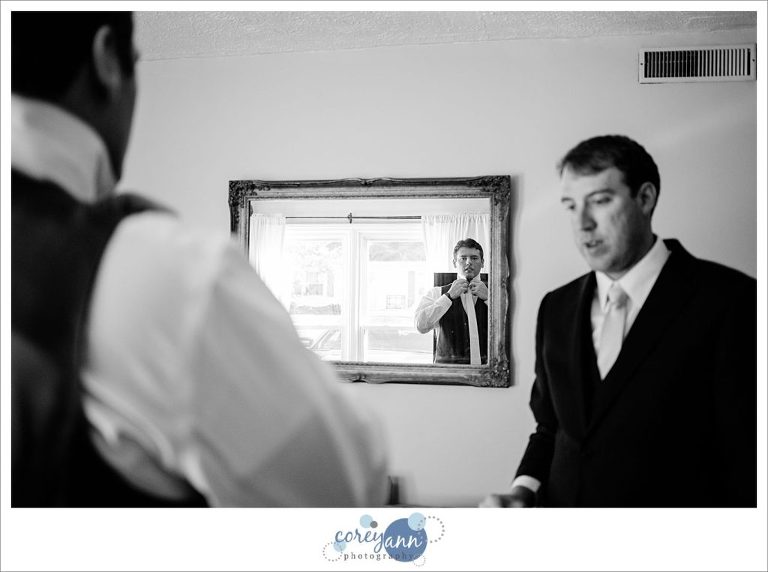 Groom getting ready for wedding in Stow Ohio
