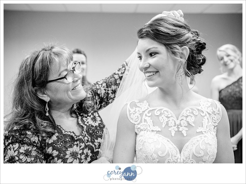 Bride getting dressed for wedding ceremony at Parkside Church