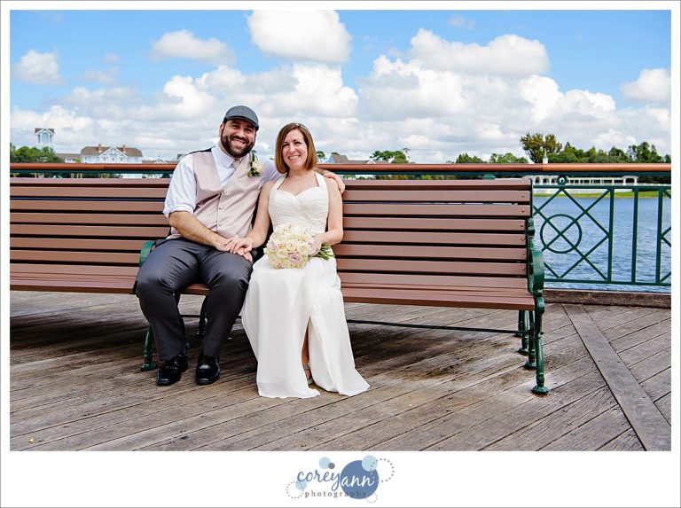 Wedding portrait on bench at Disney BoardWalk
