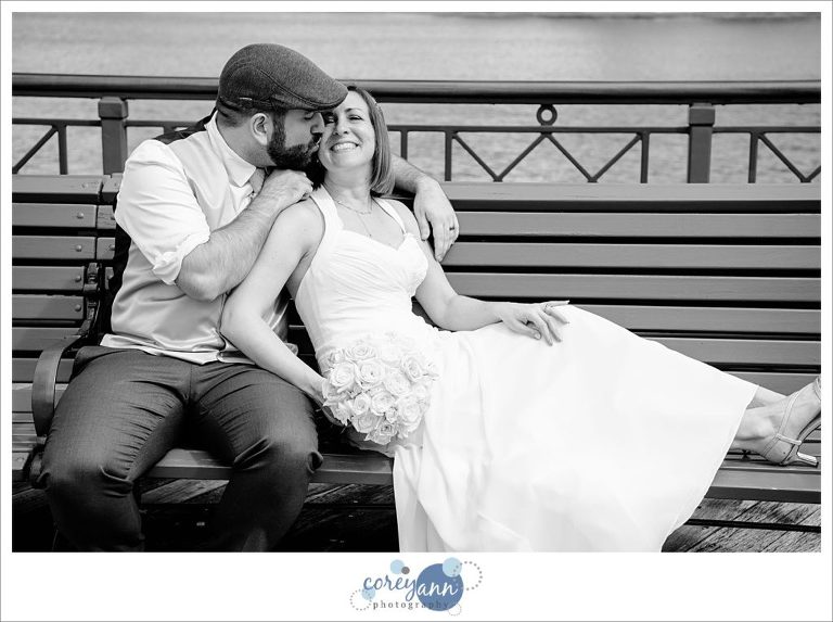 Wedding portrait on bench at Disney BoardWalk