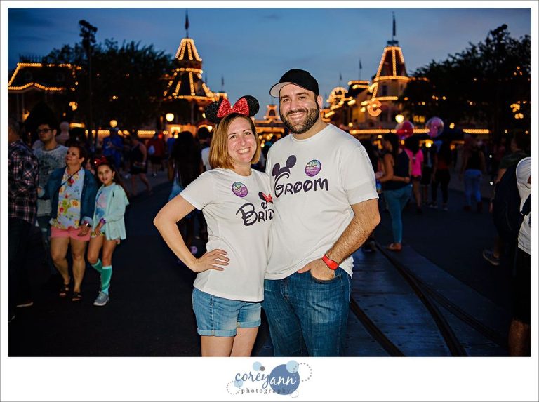 Newlyweds wearing Bride and Groom t-shirts at Disney World
