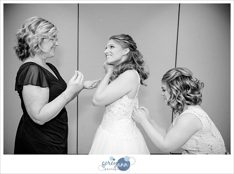 Bride getting ready for wedding at Roses Run Country Club