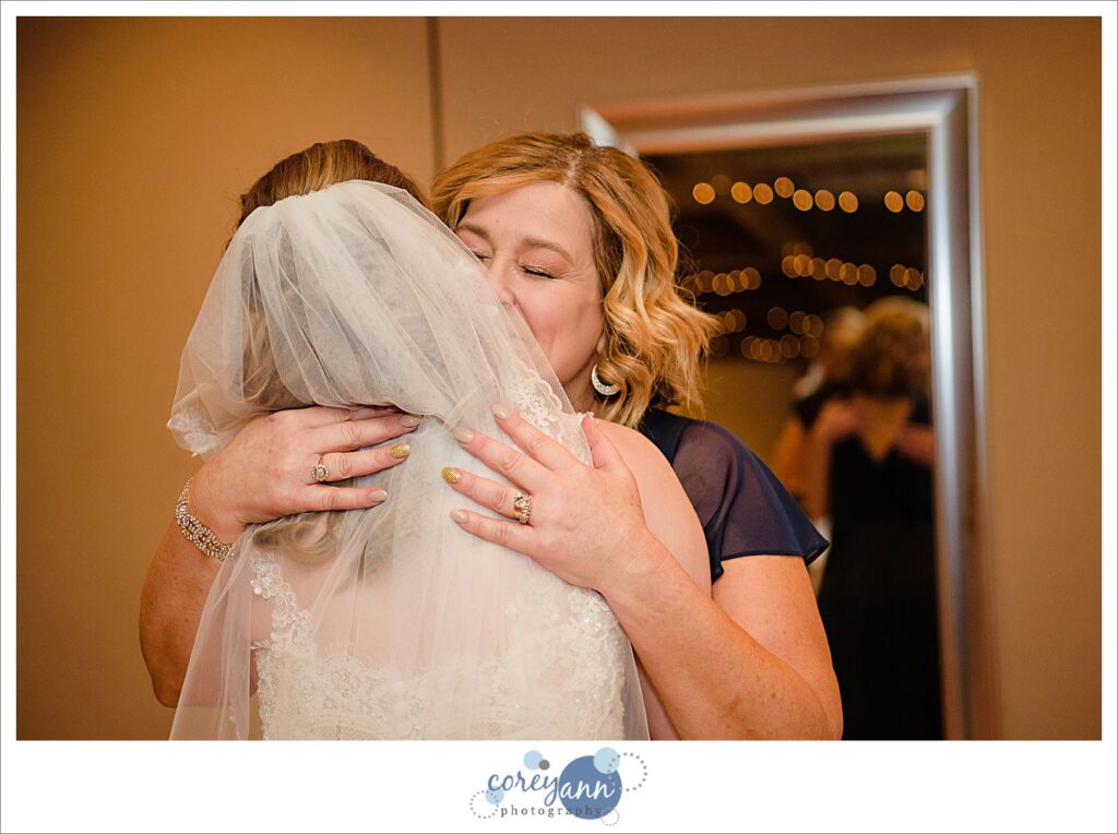 Bride getting ready for wedding at Roses Run Country Club