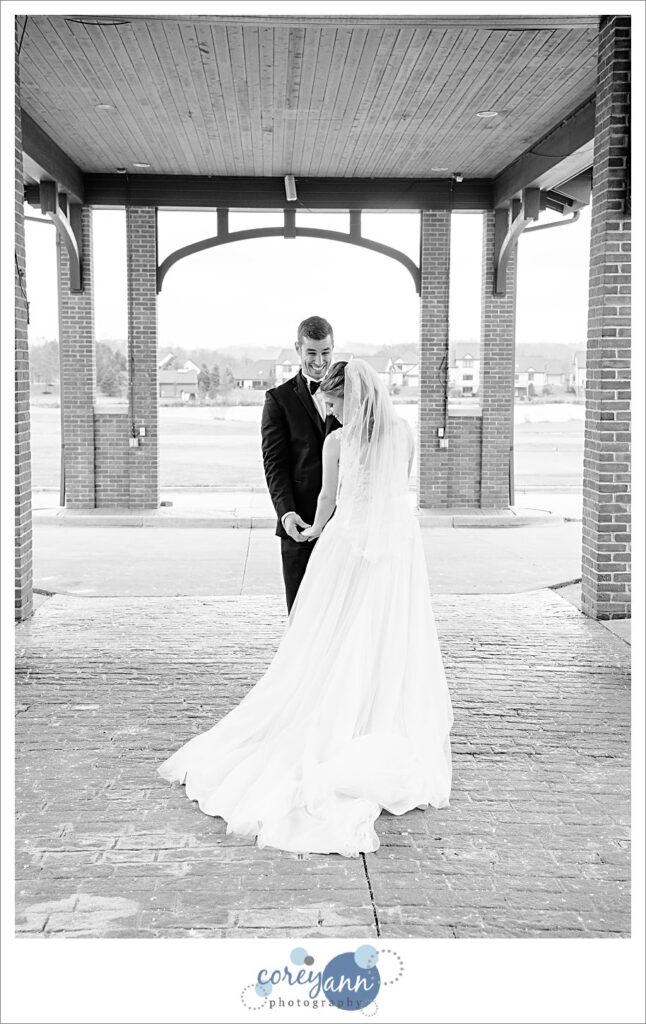 First look before wedding at Roses Run Country Club in Stow Ohio