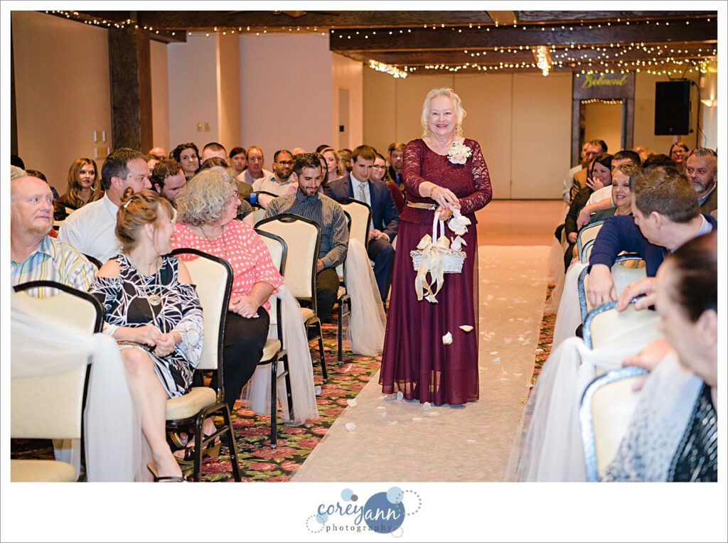 Grandmother flower girl at wedding ceremony at Roses Run