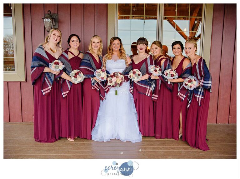 Bride with Bridesmaids in long red gowns