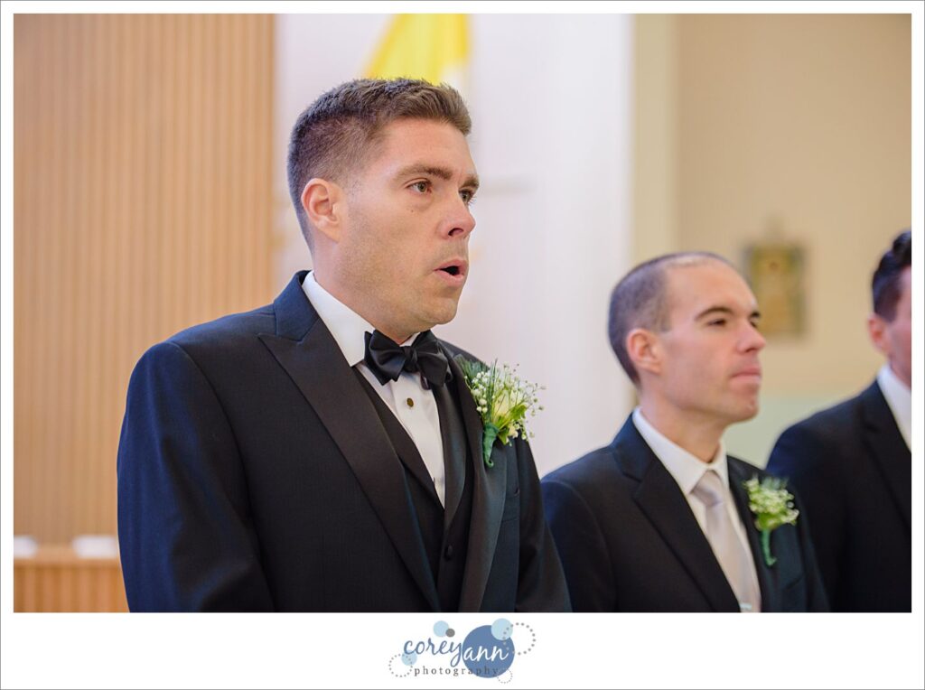 Wedding ceremony at Holy Family Catholic Church in Parma Ohio