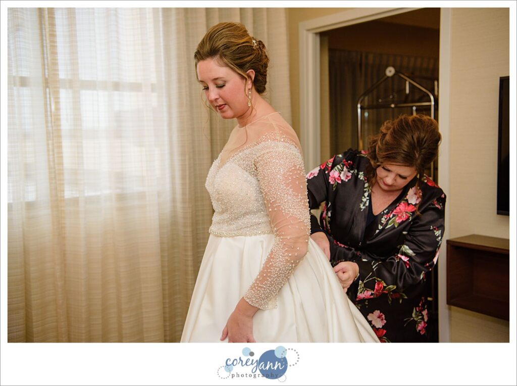 Bride getting ready for wedding at Embassy Suites in North Canton