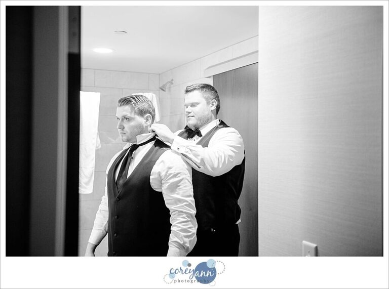 Groom getting ready for wedding at Embassy Suites in North Canton