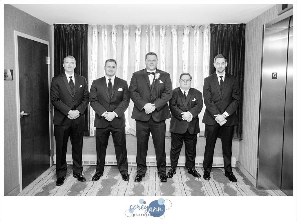 Groom getting ready for wedding at Embassy Suites in North Canton