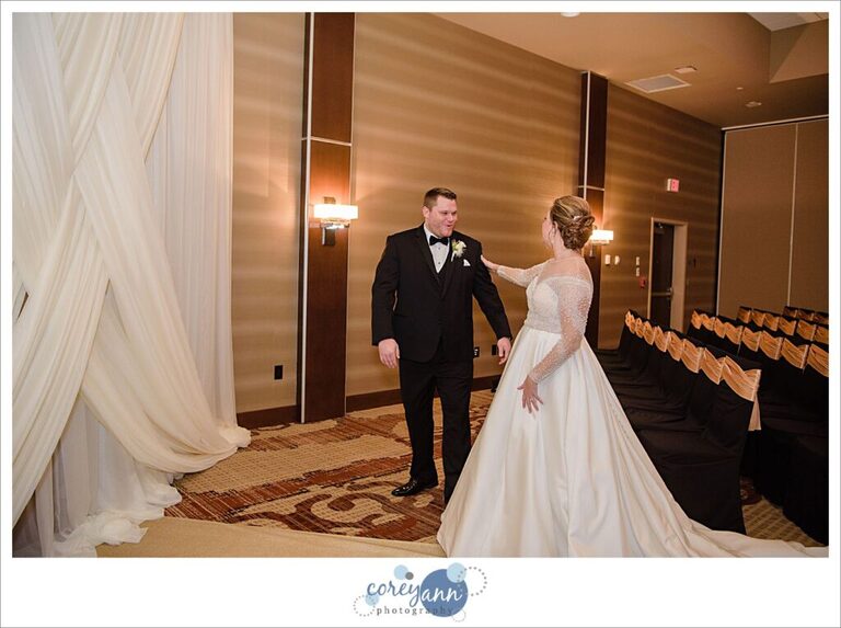 First Look before wedding at Embassy Suites in North Canton