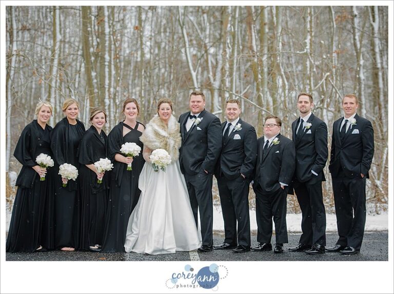 wedding bridal party in snow at boettler park in green ohio